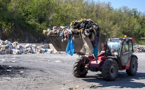 wheel-loader-transporting-municipal-waste-waste-treatment-plant